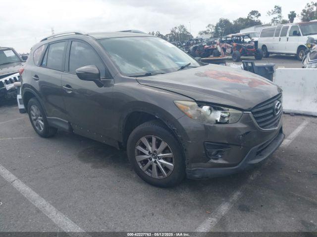  Salvage Mazda Cx